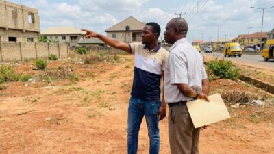 man and agent inspect land cf1374d472 1000x600.jpeg