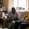 a nigerian man and a ghanaian man laughing togethe delpmaspu 1000x600.jpg